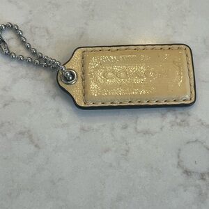 Coach Pale Yellow Patent Leather Hangtag